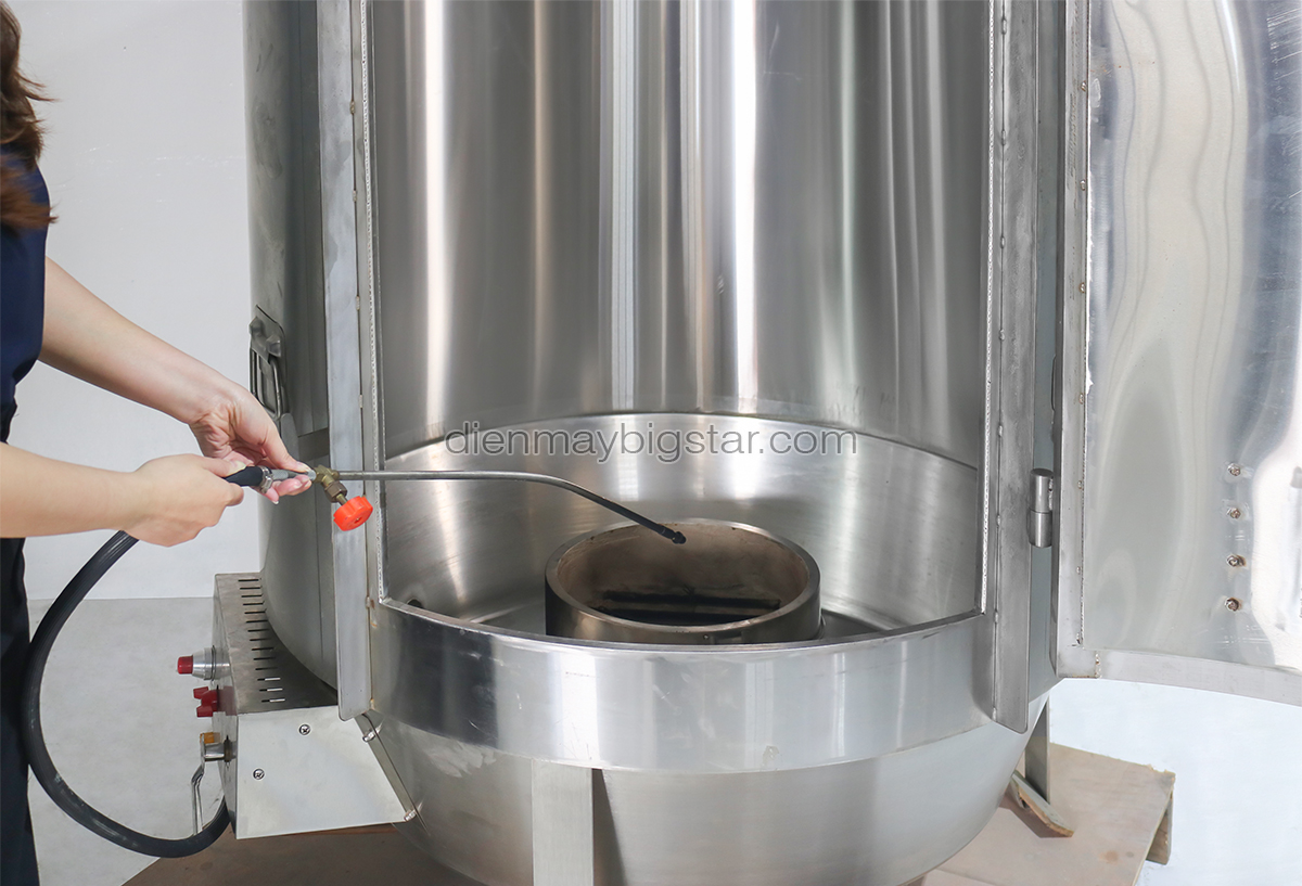 Lo quay heo nguyen con dung gas 7